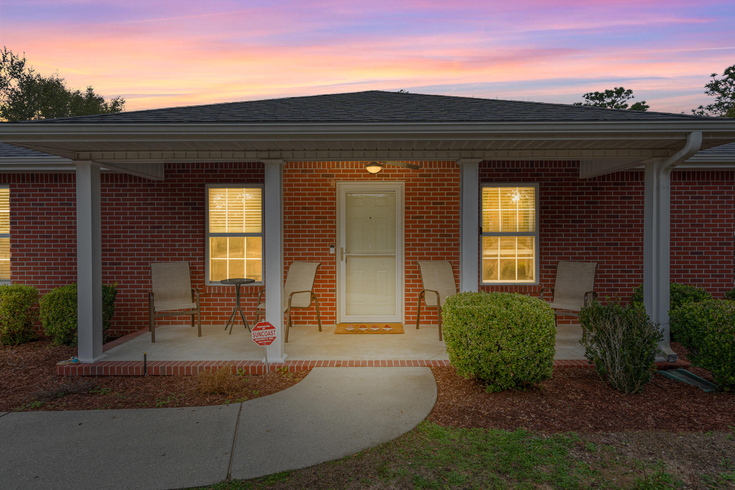 5570 Mt Olive Road Crestview, FL 32539 - Photo 2 of 57 front view of a house with a porch