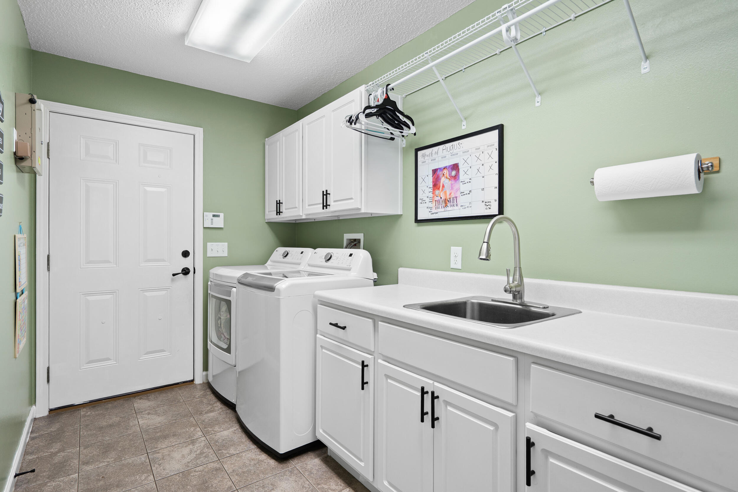 5570 Mt Olive Road Crestview, FL 32539 - Photo 27 of 57 a kitchen with a sink and cabinets