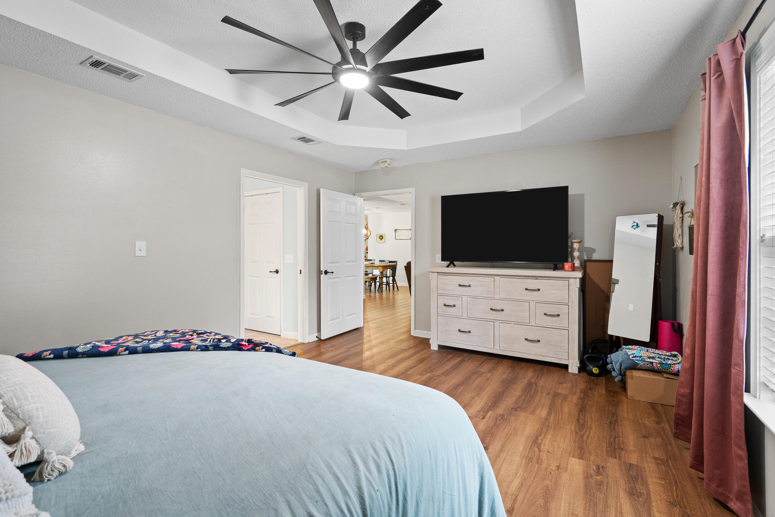 5570 Mt Olive Road Crestview, FL 32539 - Photo 31 of 57 a view of a livingroom with furniture and a flat screen tv