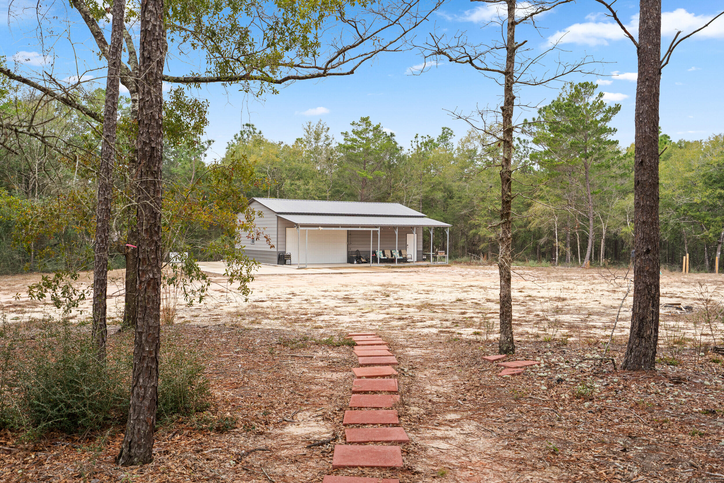 5570 Mt Olive Road Crestview, FL 32539 - Photo 43 of 57 a front view of a house with a yard