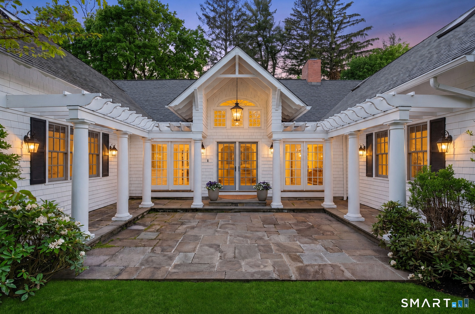41 Peaceable Street Ridgefield, CT 06877 - Photo 3 of 40 a front view of a house with a yard