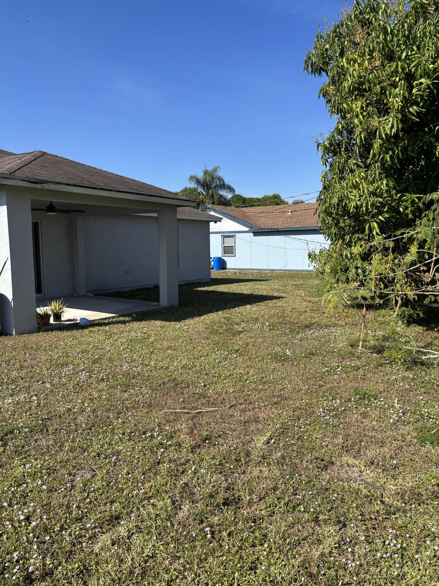 4397 Southwest Calah Circle Port St. Lucie, FL 34953 - Photo 10 of 10 a view of outdoor space and yard