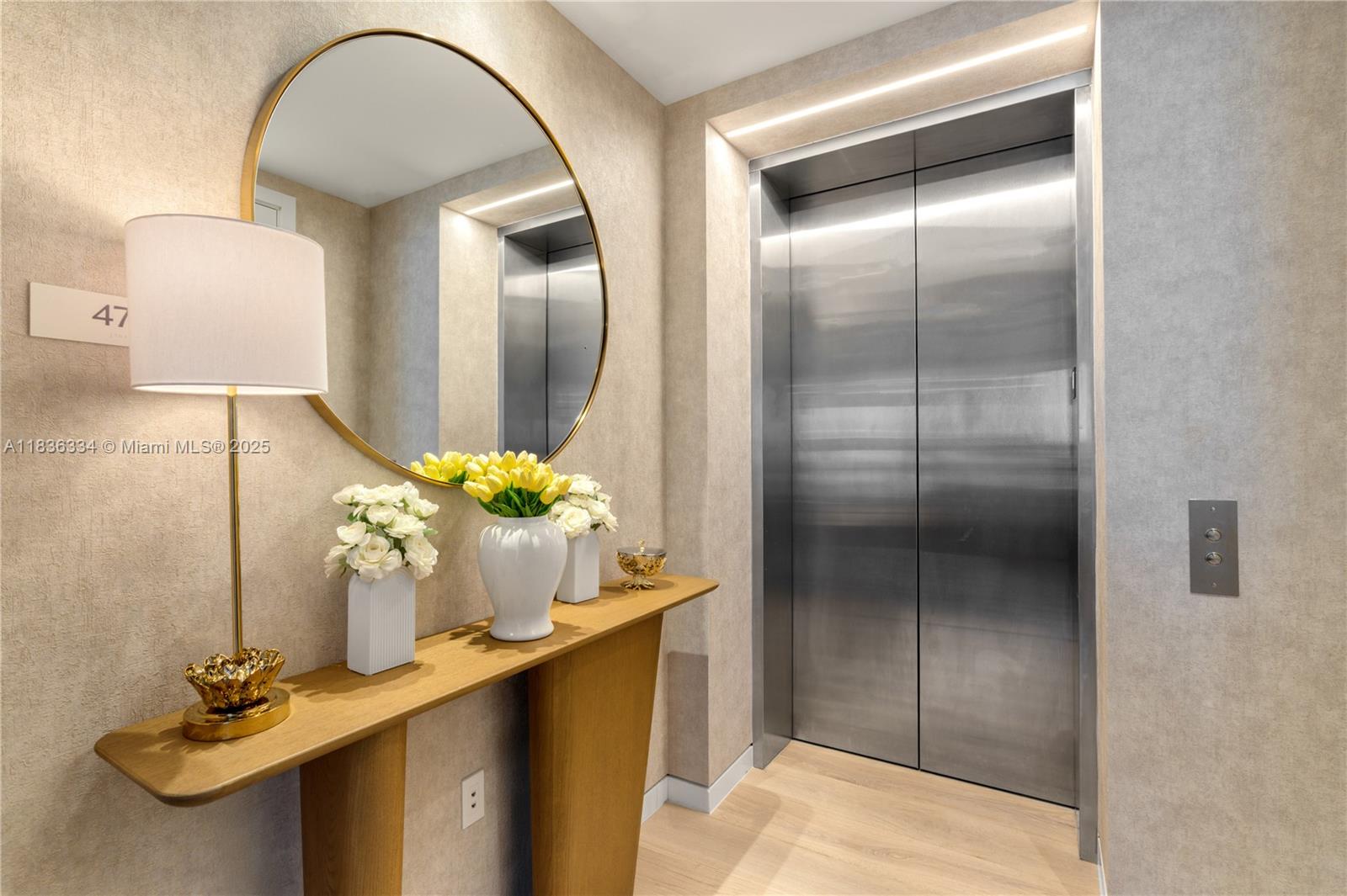 300 Biscayne Blvd Way, Unit 4707 Miami, FL 33131 - Photo 20 of 21 a vase of flowers sitting on a table