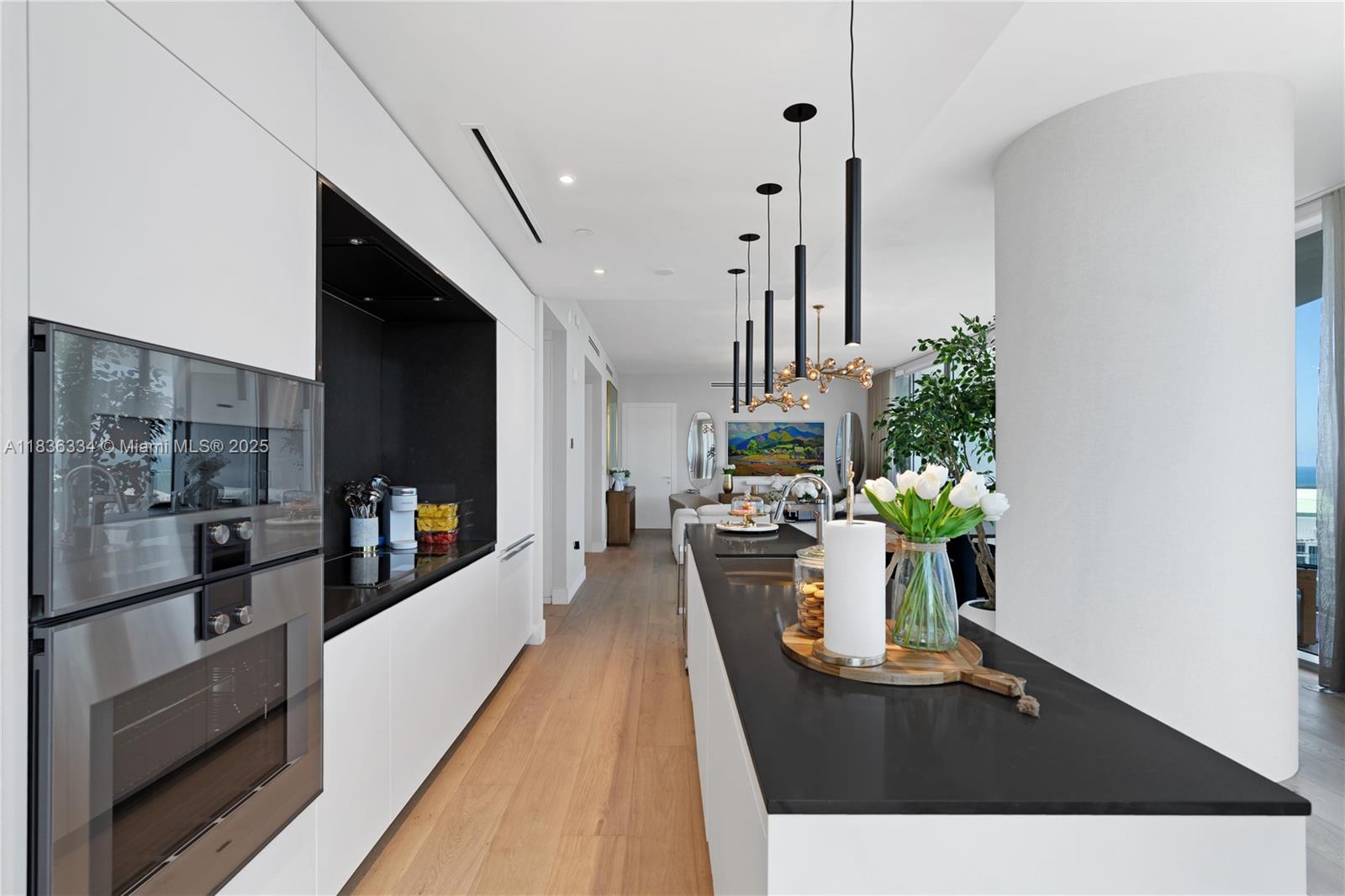 300 Biscayne Blvd Way, Unit 4707 Miami, FL 33131 - Photo 6 of 21 a living room with furniture and a flat screen tv