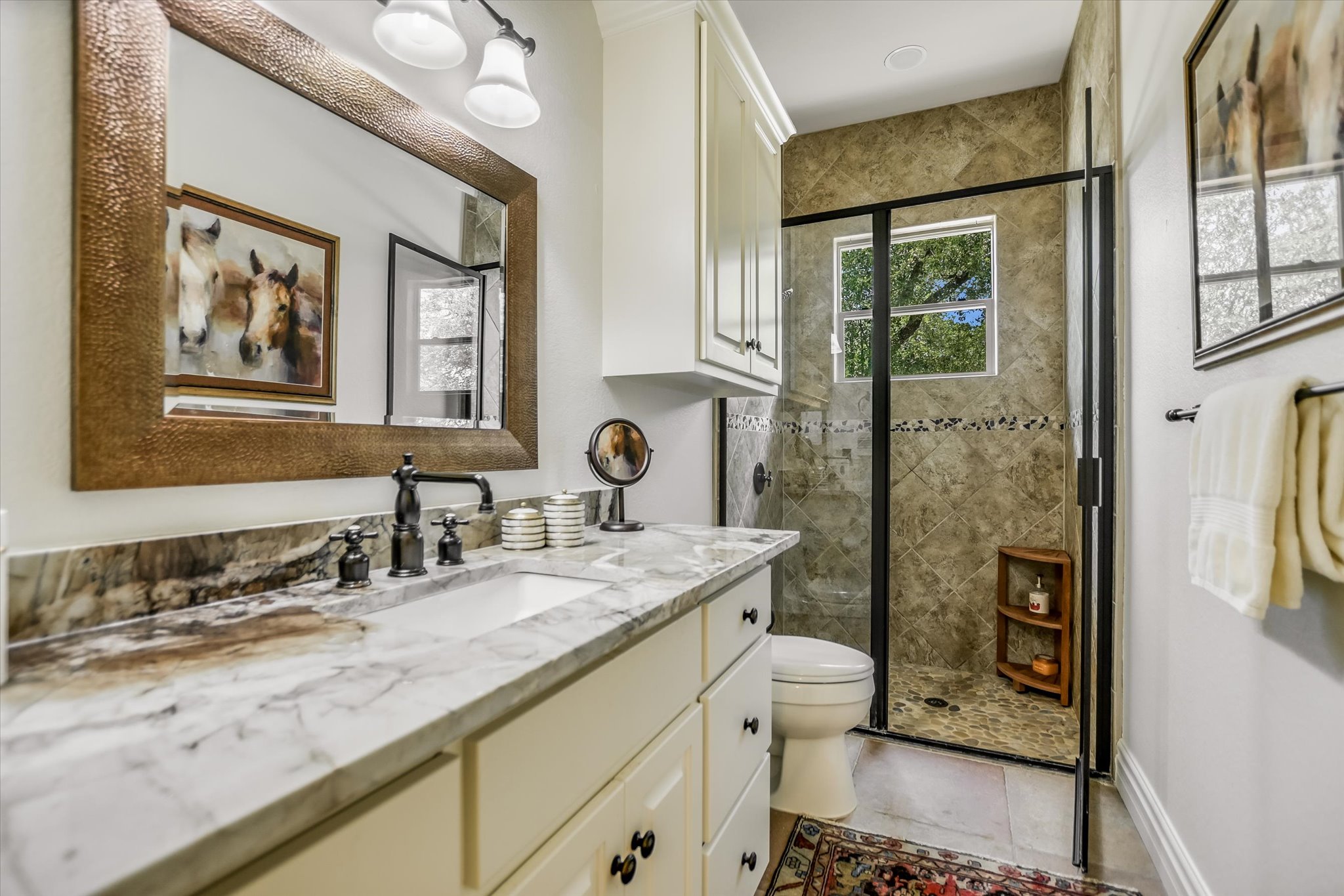 817 Woodcreek Ranch Road Wimberley, TX 78676 - Photo 21 of 40 2nd Bathroom w/ quartzite counters and walk in shower