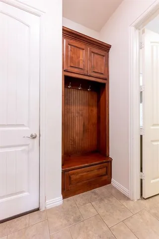a bathroom with a sink toilet and mirror