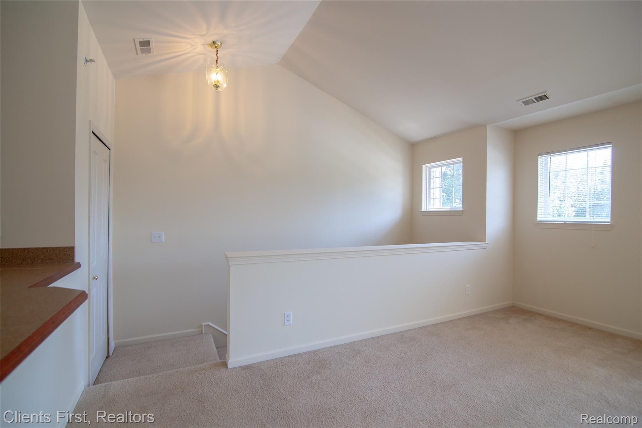 34096 Utica Road Fraser, MI 48026 - Photo 6 of 20 Landing/Living Room