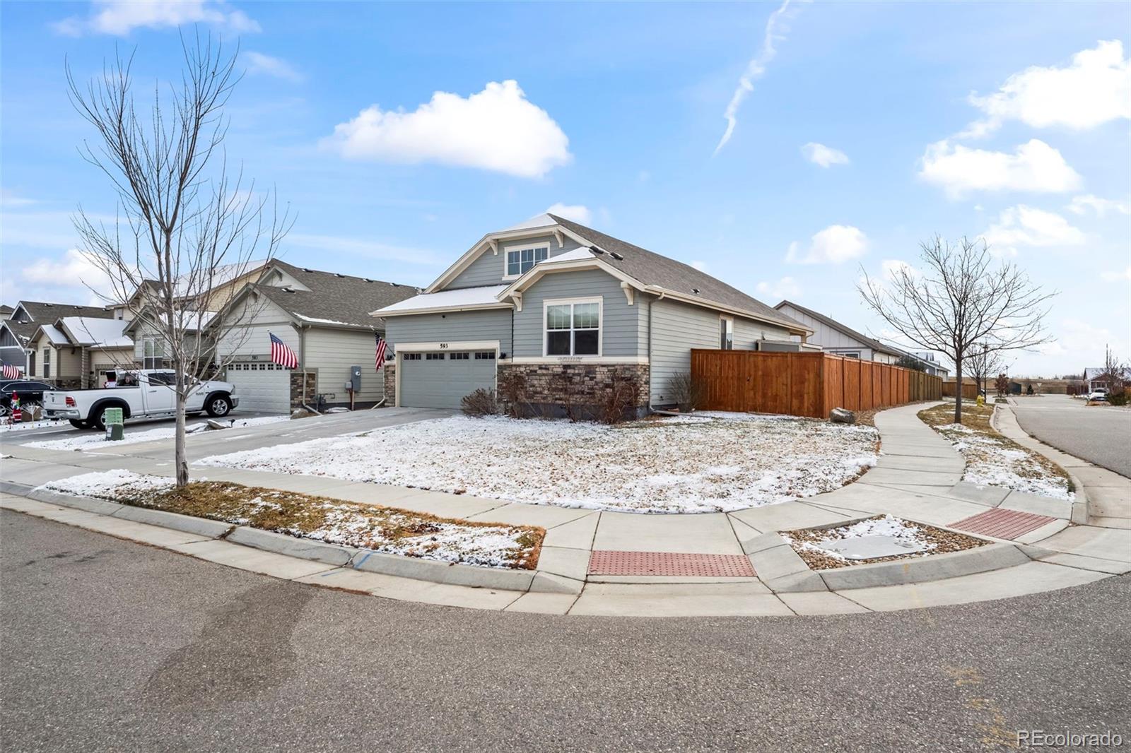 593 Country Road Berthoud, CO 80513 - Photo 2 of 34 a front view of a house with a yard