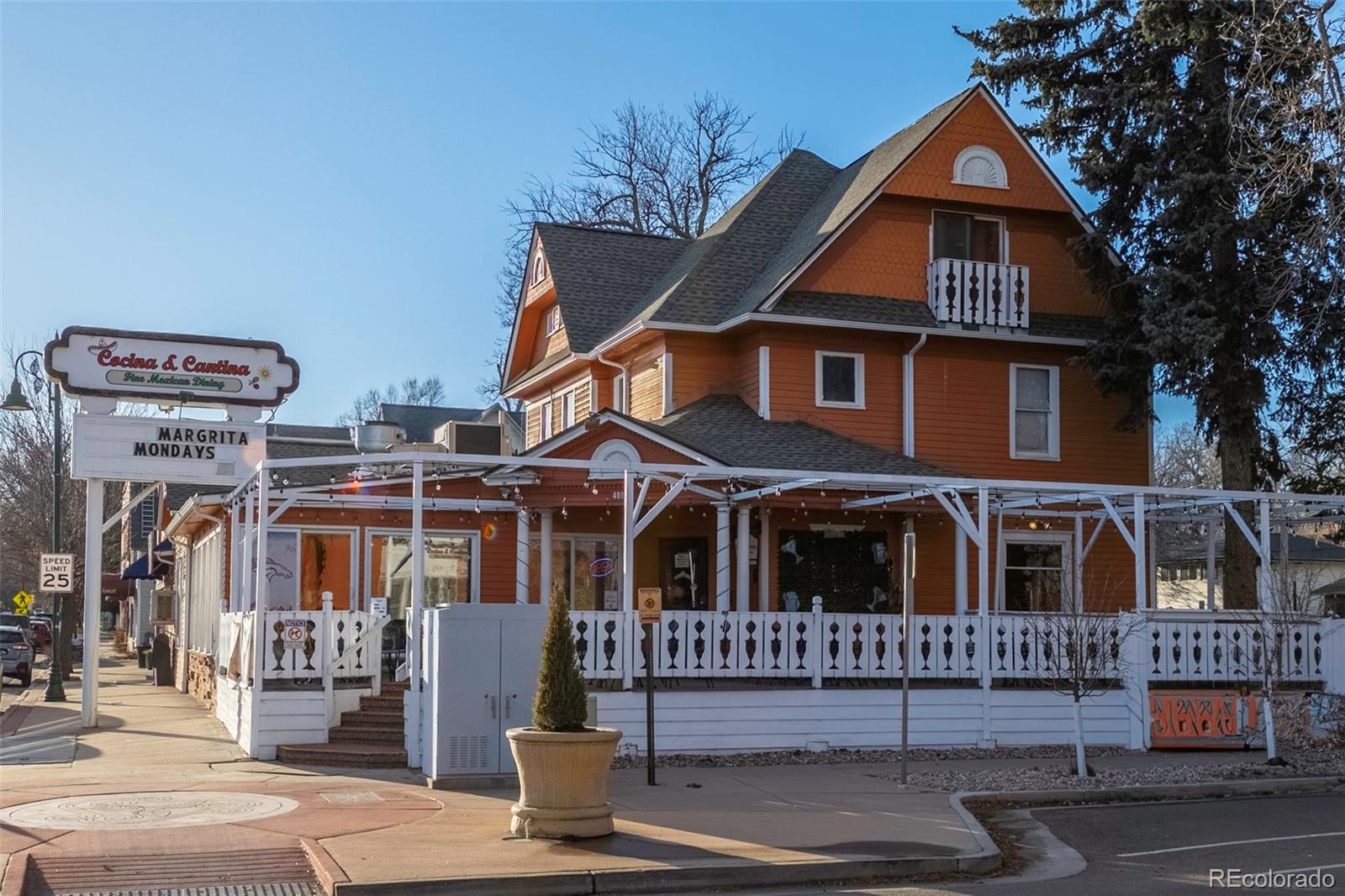 593 Country Road Berthoud, CO 80513 - Photo 32 of 34 front view of a house with a street