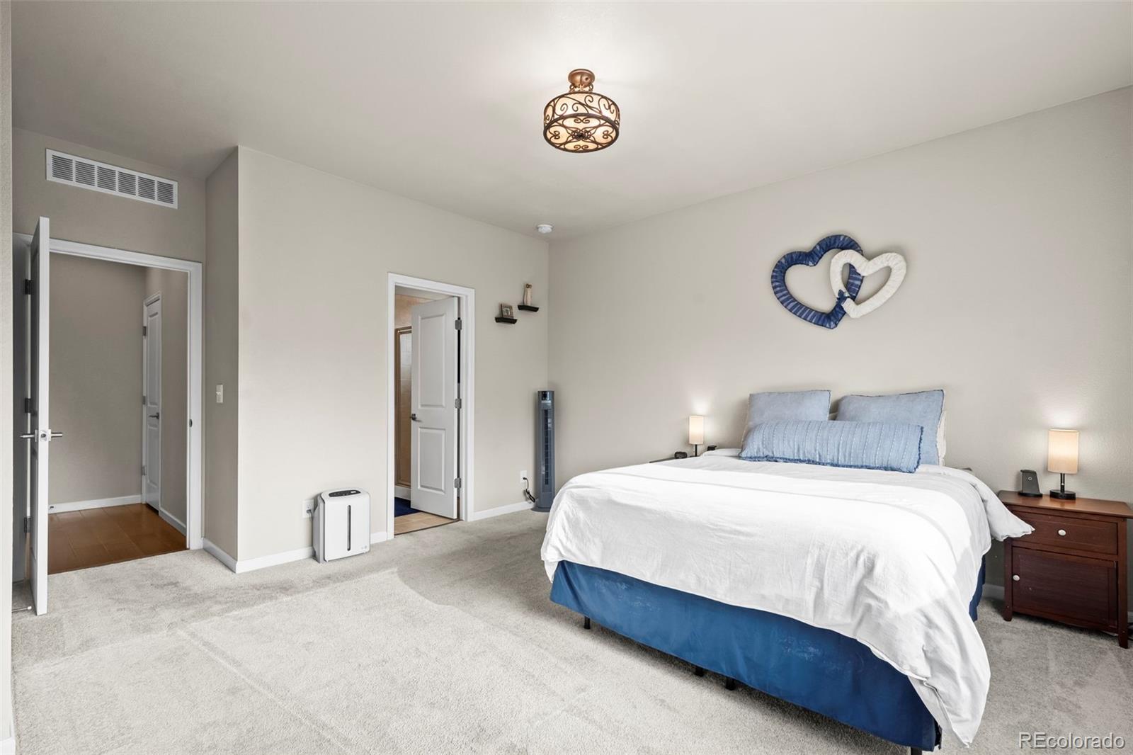 593 Country Road Berthoud, CO 80513 - Photo 10 of 34 a bedroom with a bed and a window