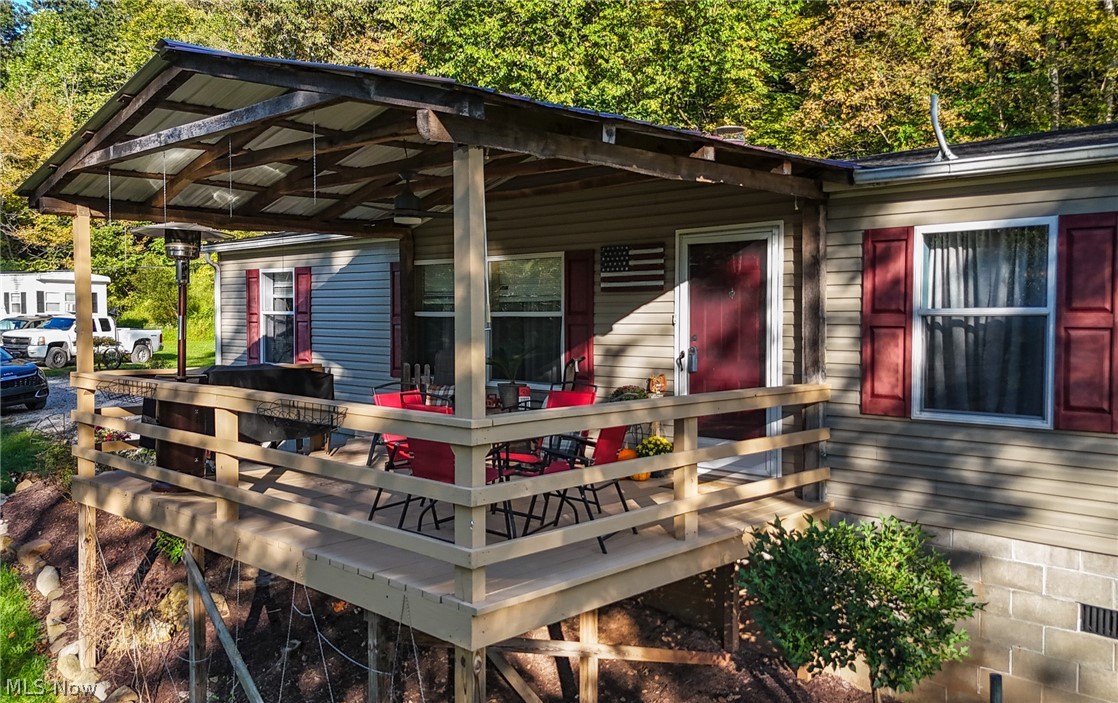 1788 Rosenbush Road Newport, OH 45768 - Photo 4 of 34 Covered wood deck with metal roof structure