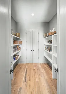 a bedroom with bed and window