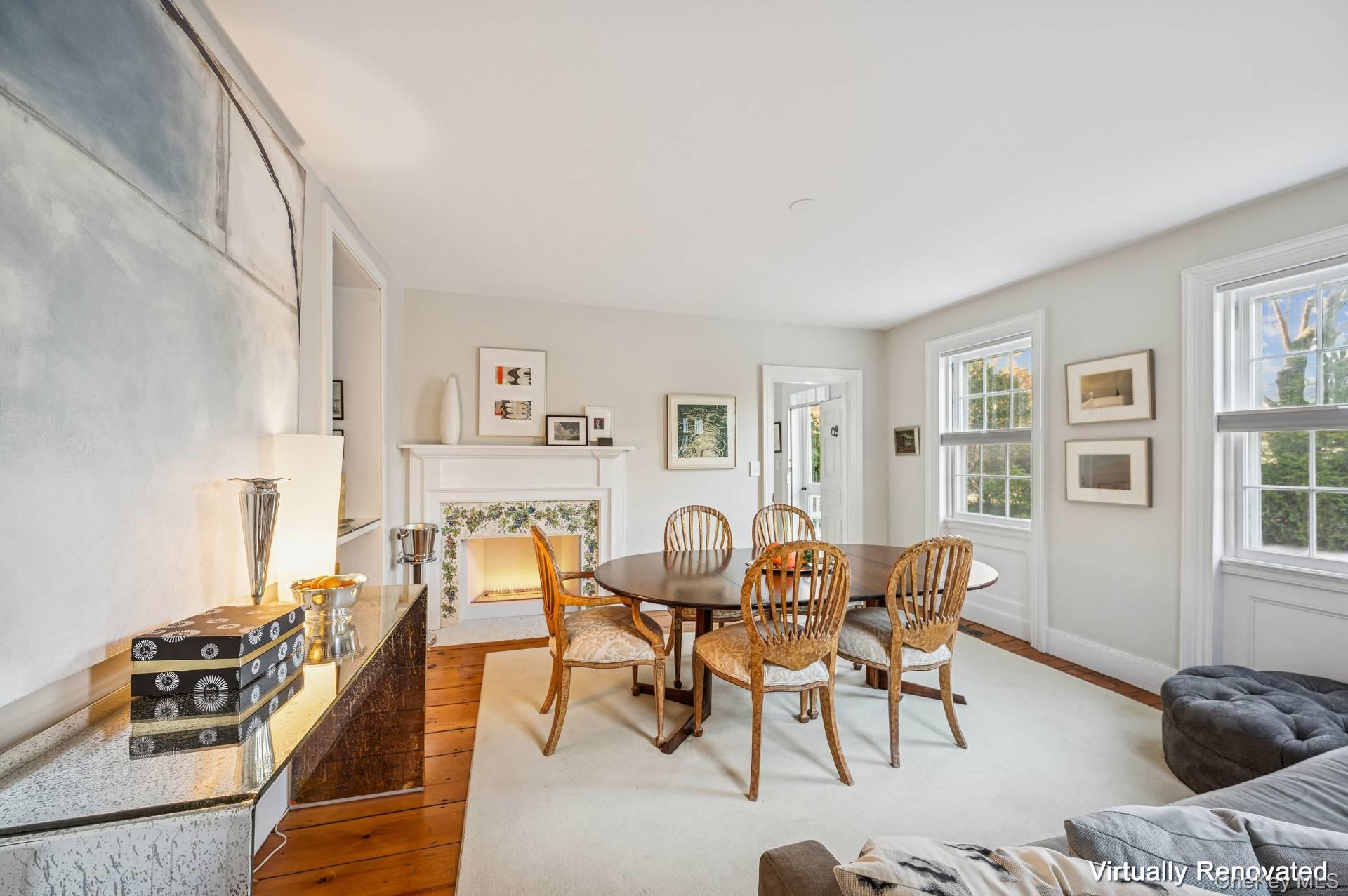 94 Post Lane Southampton, NY 11968 - Photo 17 of 34 a view of a dining room with furniture and wooden floor