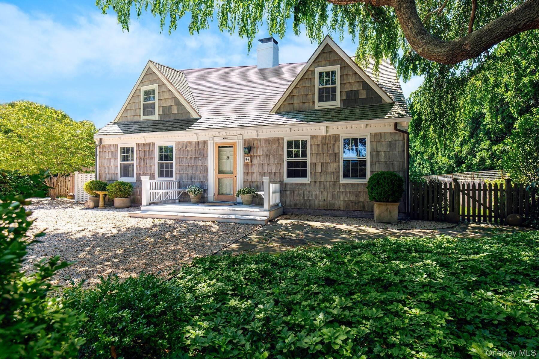94 Post Lane Southampton, NY 11968 - Photo 4 of 34 front view of a house with a yard