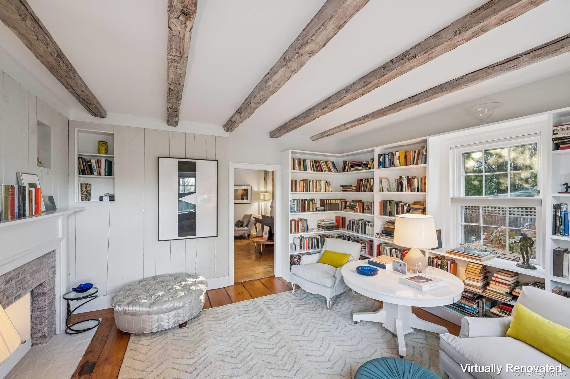 94 Post Lane Southampton, NY 11968 - Photo 8 of 34 a living room with furniture and a flat screen tv