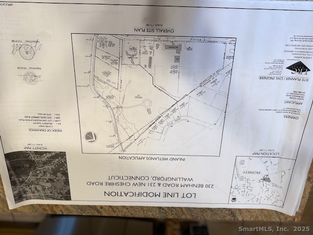 201 New Cheshire Road Wallingford, CT 06492 - Photo 9 of 13 view of a book shelf