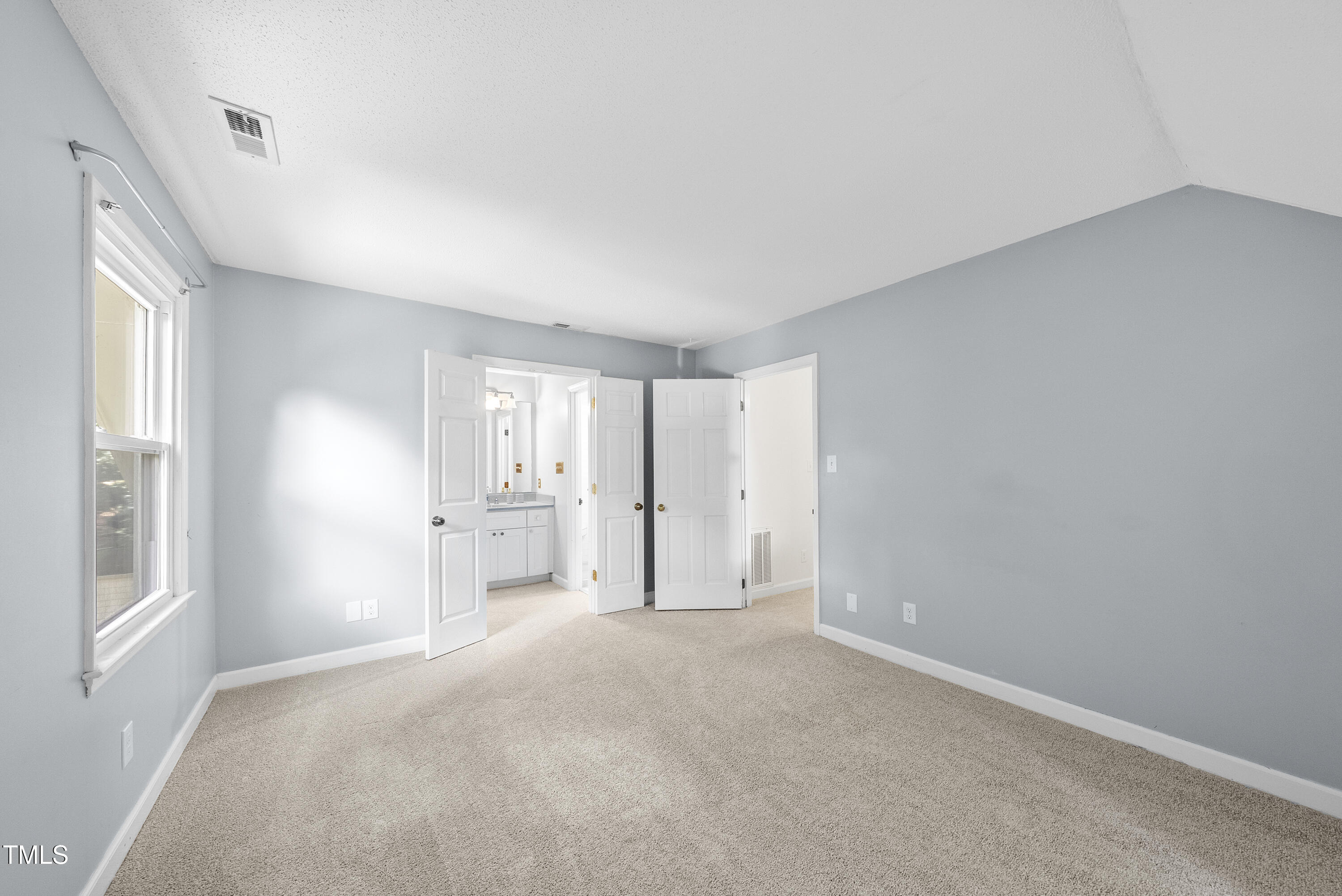 8629 Windjammer Drive Raleigh, NC 27615 - Photo 32 of 56 Primary Bedroom