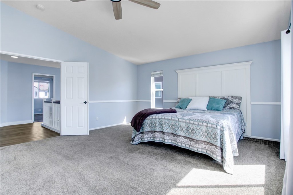 32509 Sunnyvail Circle Temecula, CA 92592 - Photo 25 of 38 a bedroom with a bed and painting on the wall