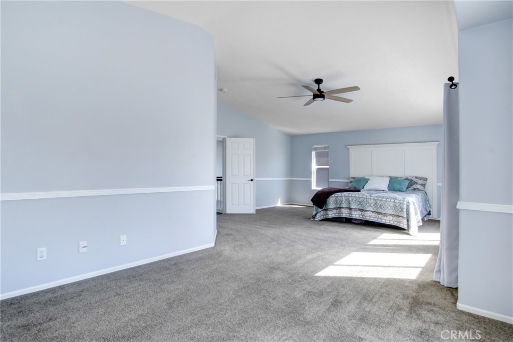 32509 Sunnyvail Circle Temecula, CA 92592 - Photo 28 of 38 a view of a livingroom with furniture and a ceiling fan