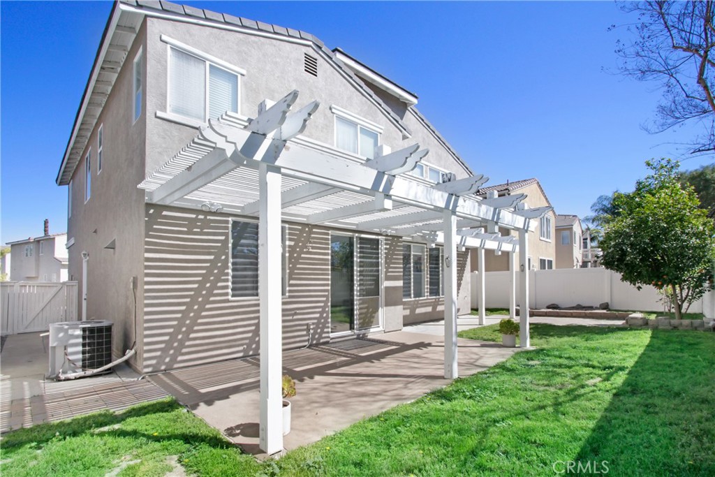32509 Sunnyvail Circle Temecula, CA 92592 - Photo 30 of 38 a view of a house with a yard and sitting area
