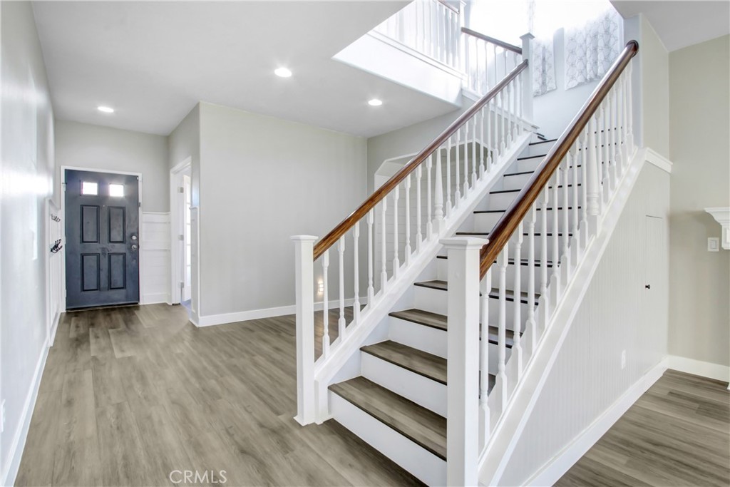 32509 Sunnyvail Circle Temecula, CA 92592 - Photo 3 of 38 a view of staircase with wooden floor and stairs