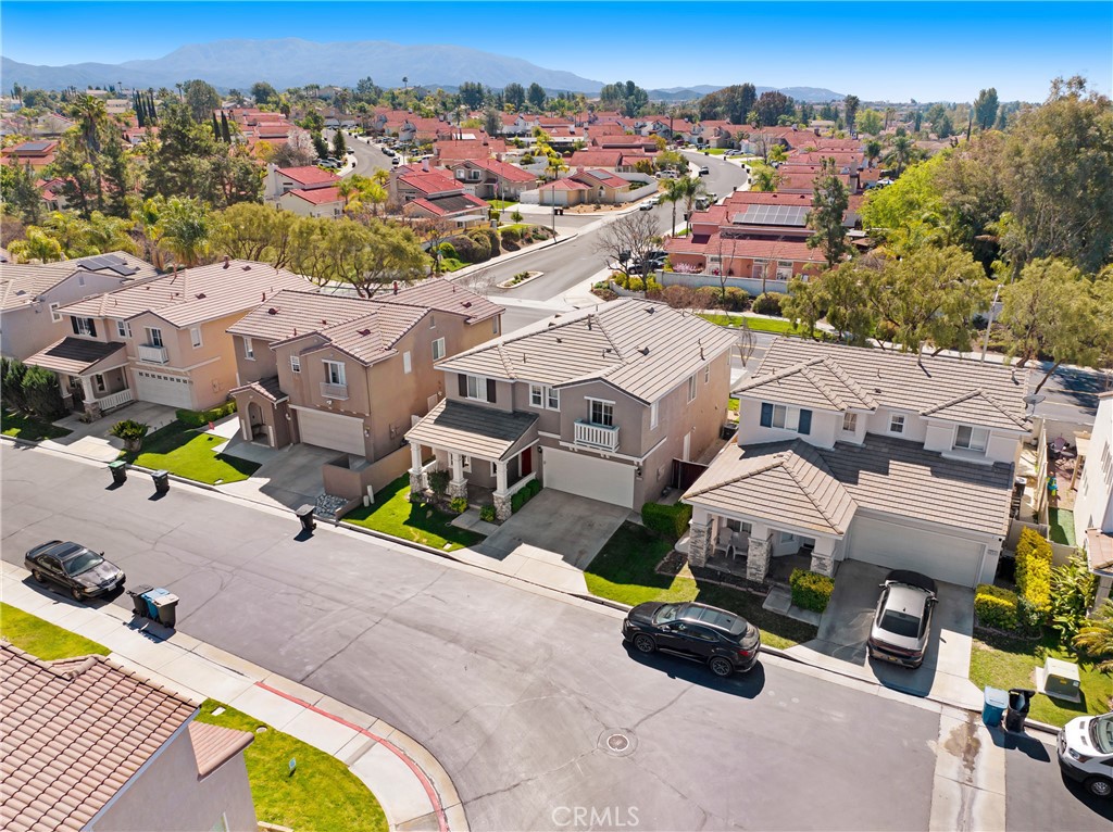 32509 Sunnyvail Circle Temecula, CA 92592 - Photo 35 of 38 an aerial view of a house with swimming pool and large trees