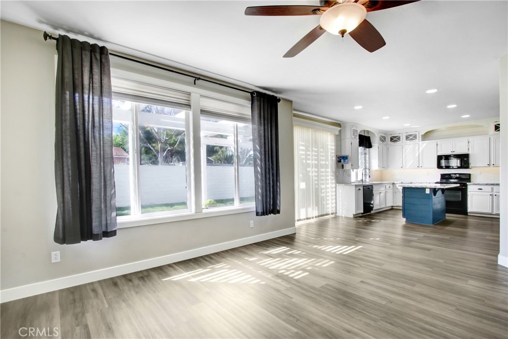 32509 Sunnyvail Circle Temecula, CA 92592 - Photo 9 of 38 a view of a kitchen with a sink and cabinets