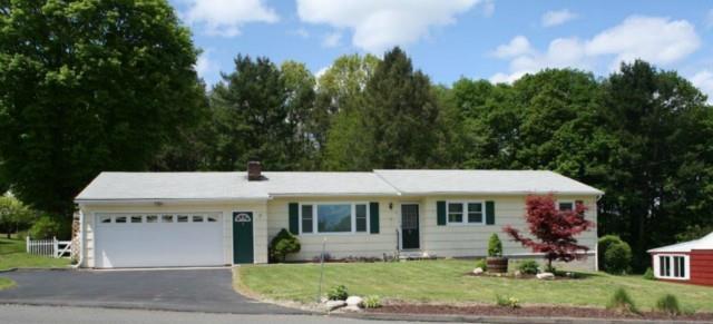 7 Wixon Road Danbury, CT 06811 - Photo 1 of 1 a view of a white house with a yard plants and large tree