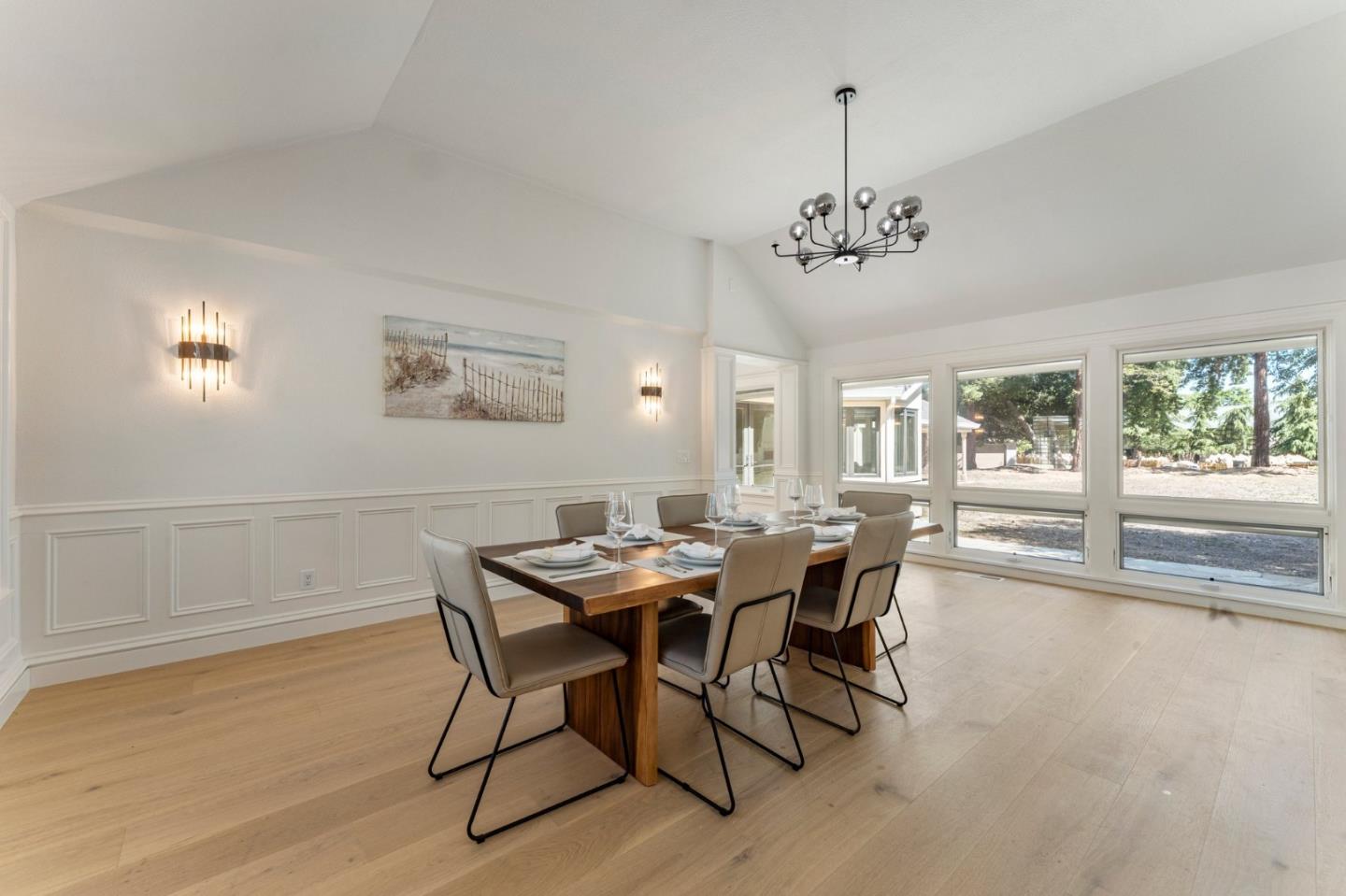 1080 Finley Road Pleasanton, CA 94588 - Photo 28 of 85 a view of a dining room with furniture wooden floor and chandelier