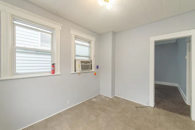 an empty room with windows