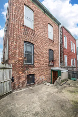 a brick building with a outdoor space