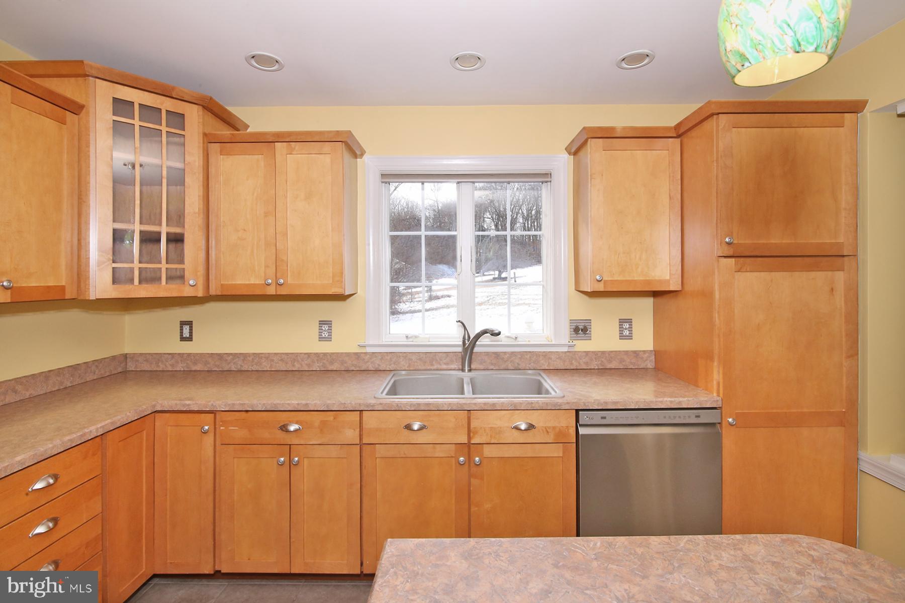 805 Mt Wilson Road Lebanon, PA 17042 - Photo 22 of 67 a kitchen with granite countertop a sink stainless steel appliances and cabinets