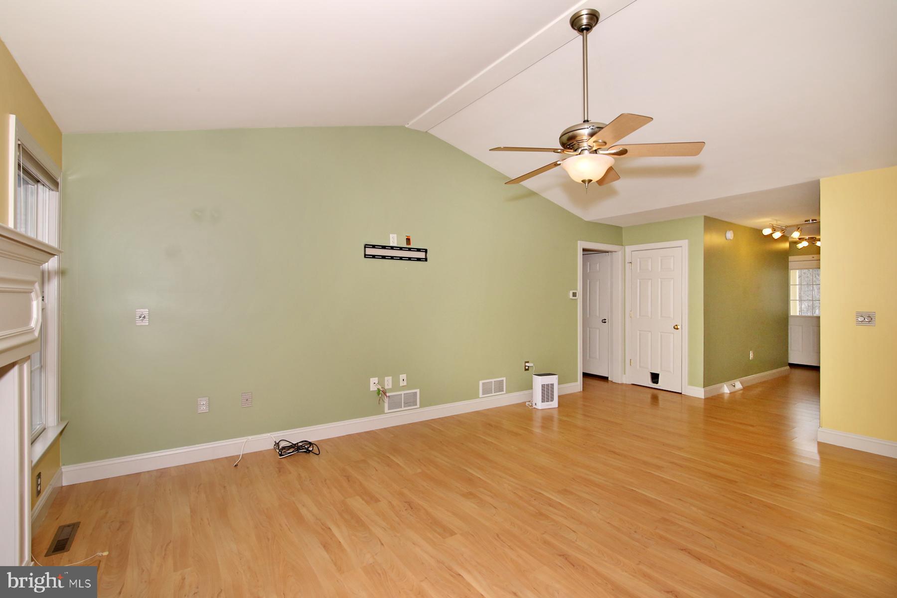 805 Mt Wilson Road Lebanon, PA 17042 - Photo 28 of 67 a view of a big room with wooden floor and windows
