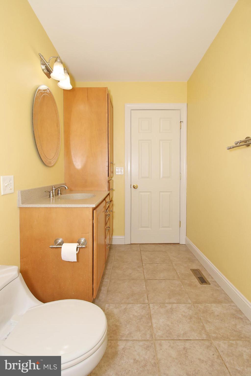 805 Mt Wilson Road Lebanon, PA 17042 - Photo 36 of 67 a bathroom with a toilet mirror and vanity