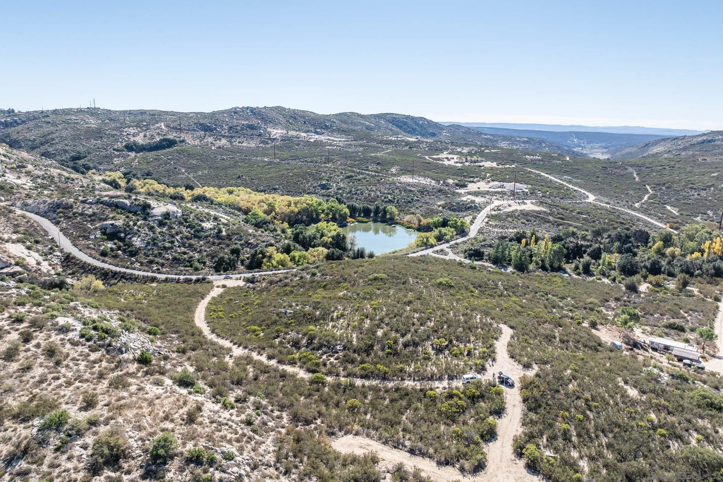 35613 Stagecoach Springs Road, Unit 466 Pine Valley, CA 91962 - Photo 19 of 28 a view of a city with mountains in the background