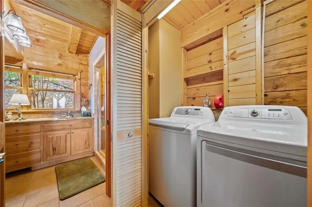 a utility room with dryer and washer
