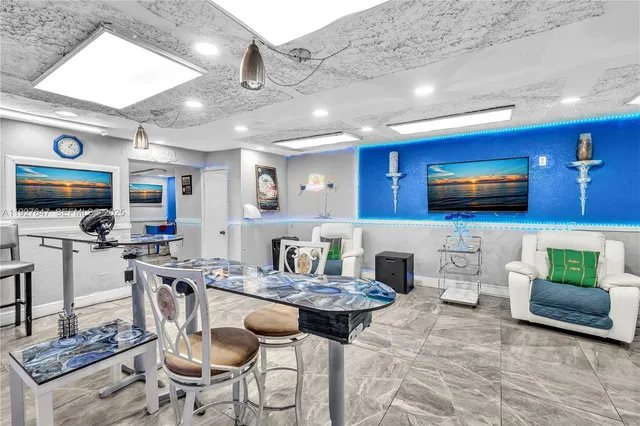 a living room with lots of furniture and lots of furniture