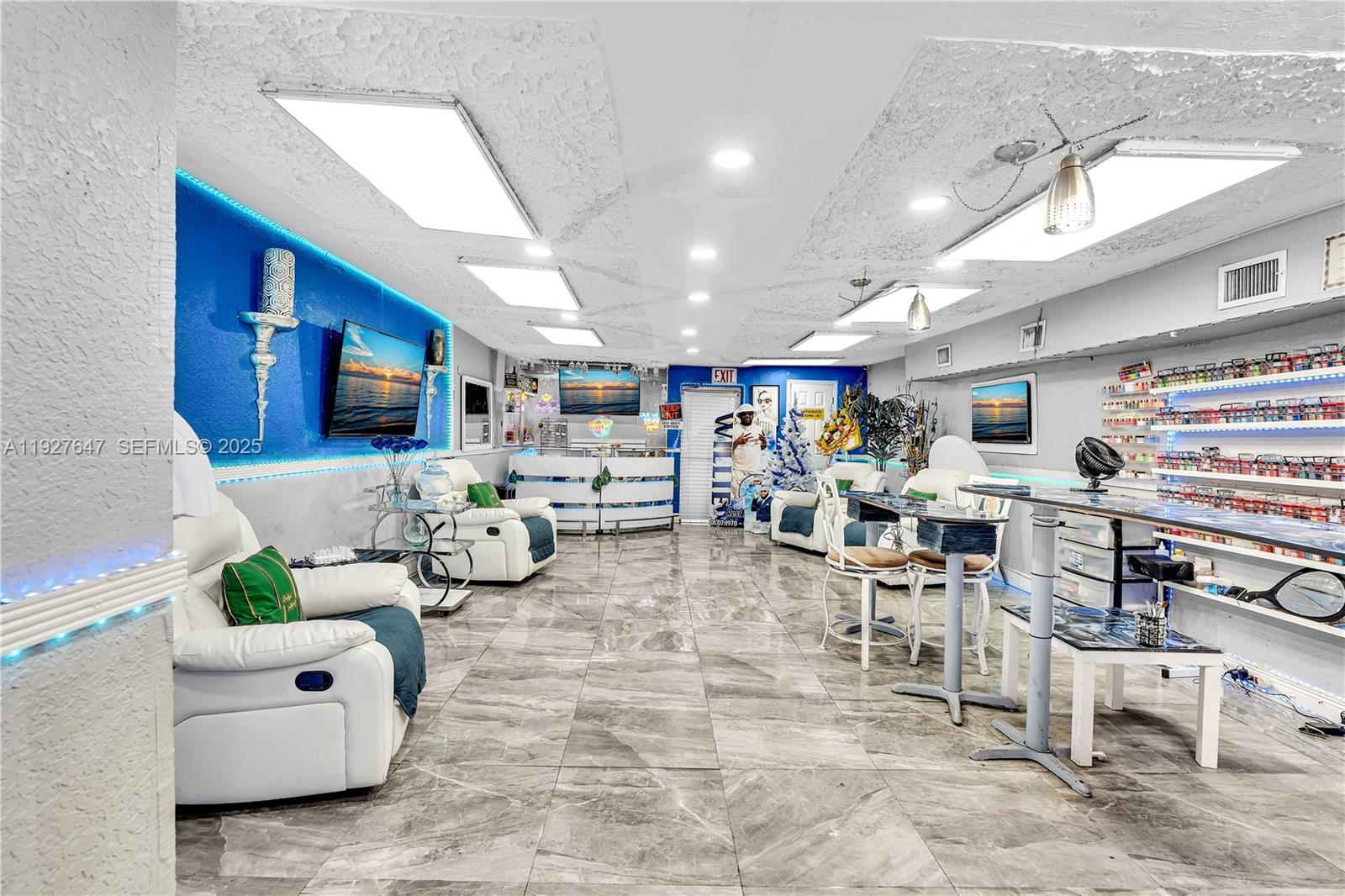 4500 Northwest 12th Avenue Miami, FL 33142 - Photo 12 of 16 a living room with lots of furniture and lots of furniture