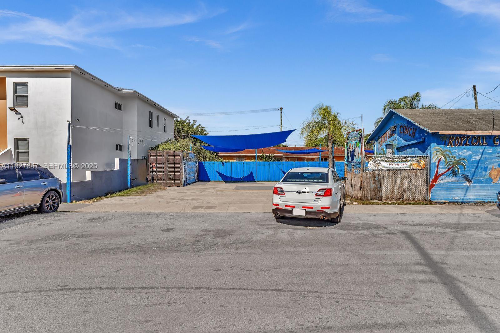 4500 Northwest 12th Avenue Miami, FL 33142 - Photo 3 of 16 a car parked in front of a house