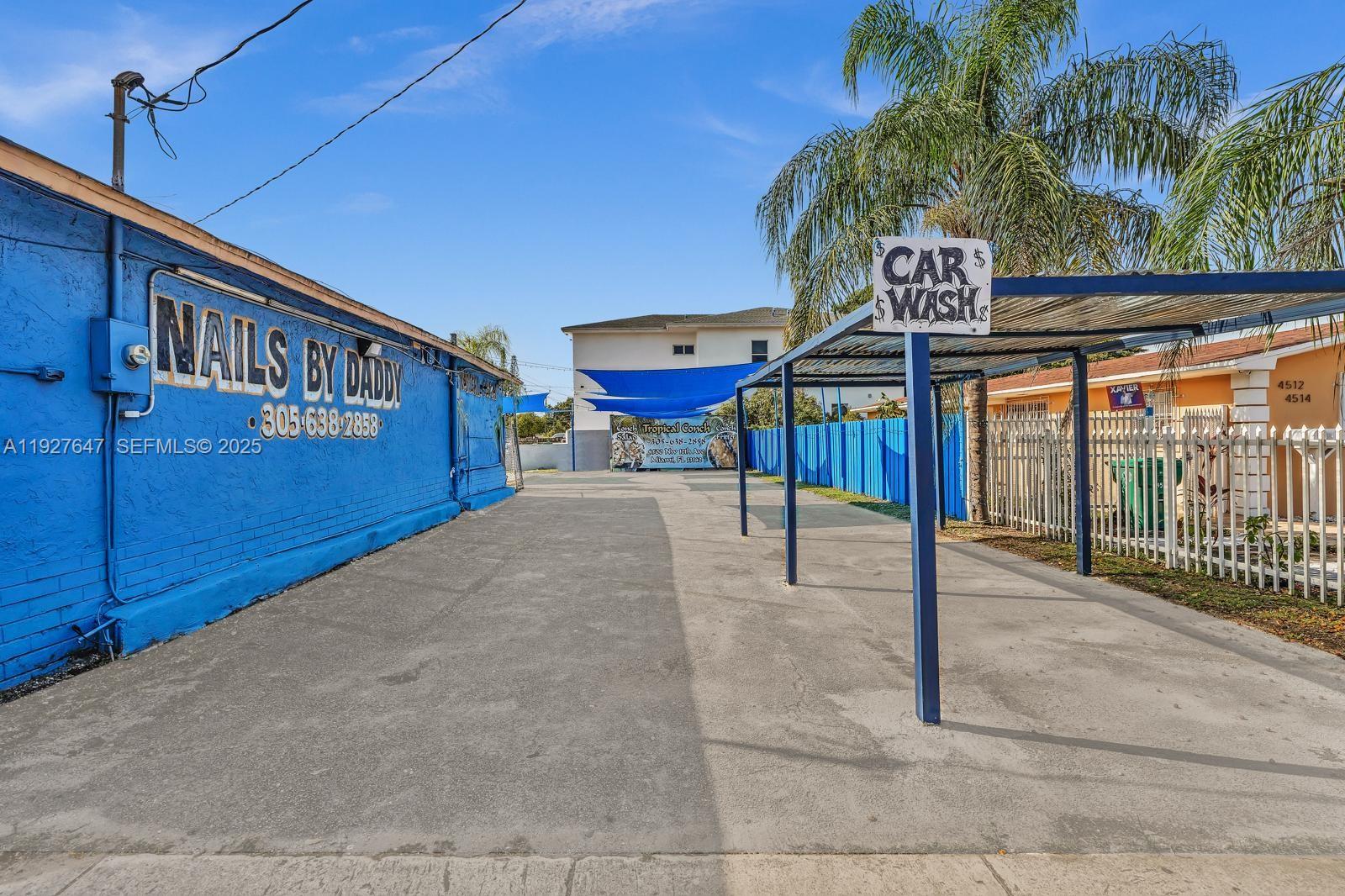 4500 Northwest 12th Avenue Miami, FL 33142 - Photo 7 of 16 a view of a patio with a table and chairs