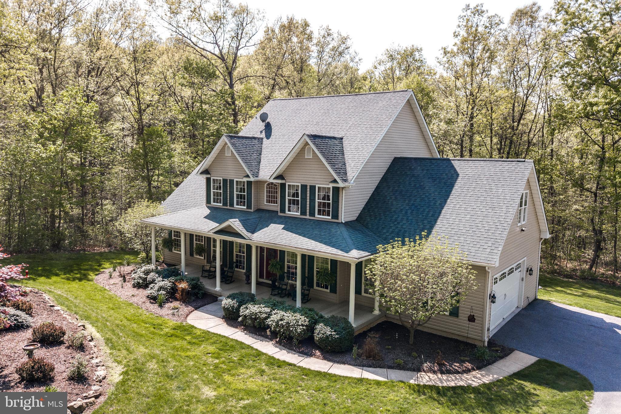 Front Exterior with Extensive Landscaping
