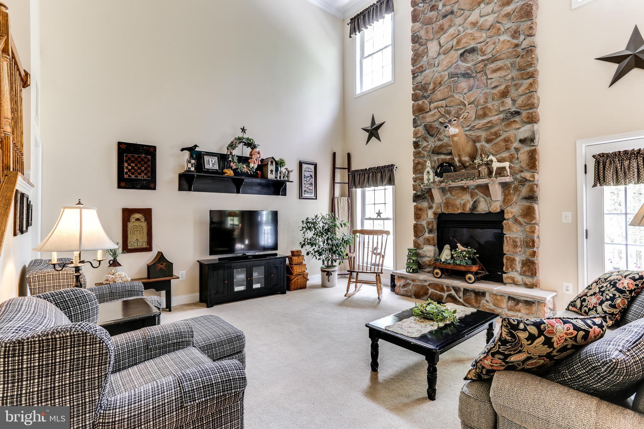 2567 Ebbvale Road Manchester, MD 21102 - Photo 15 of 50 2-Story Family Room w/ Stone Surround Gas FP