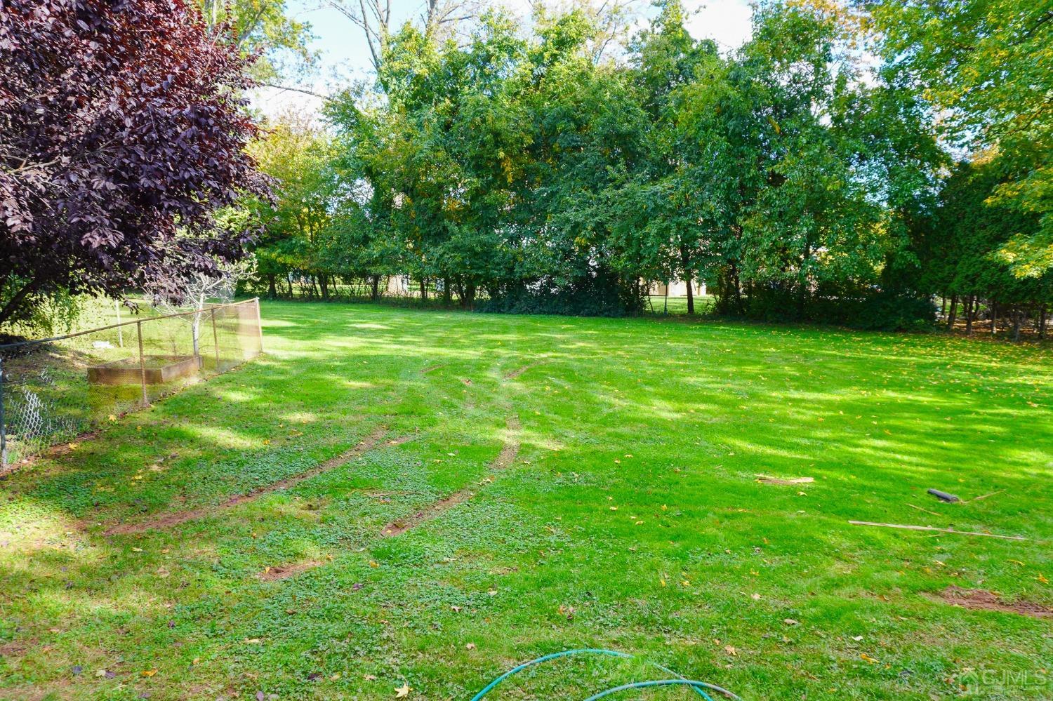 140 Meredith Road Colonia, NJ 07067 - Photo 15 of 30 a view of outdoor space with deck and yard