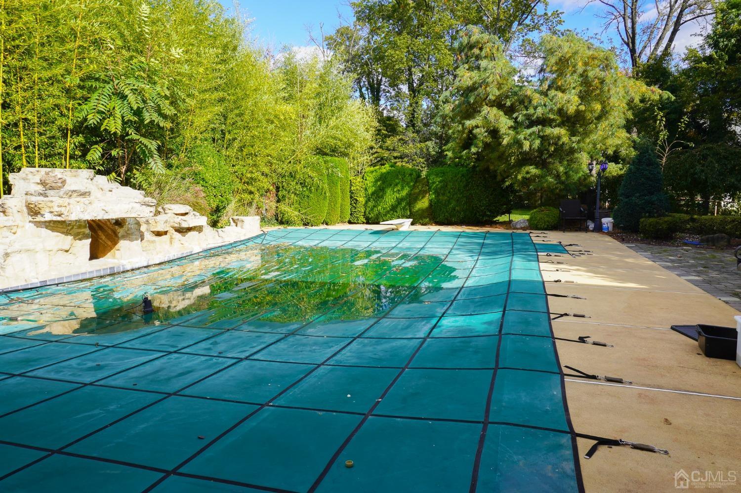 140 Meredith Road Colonia, NJ 07067 - Photo 16 of 30 a backyard of a house with yard and outdoor seating
