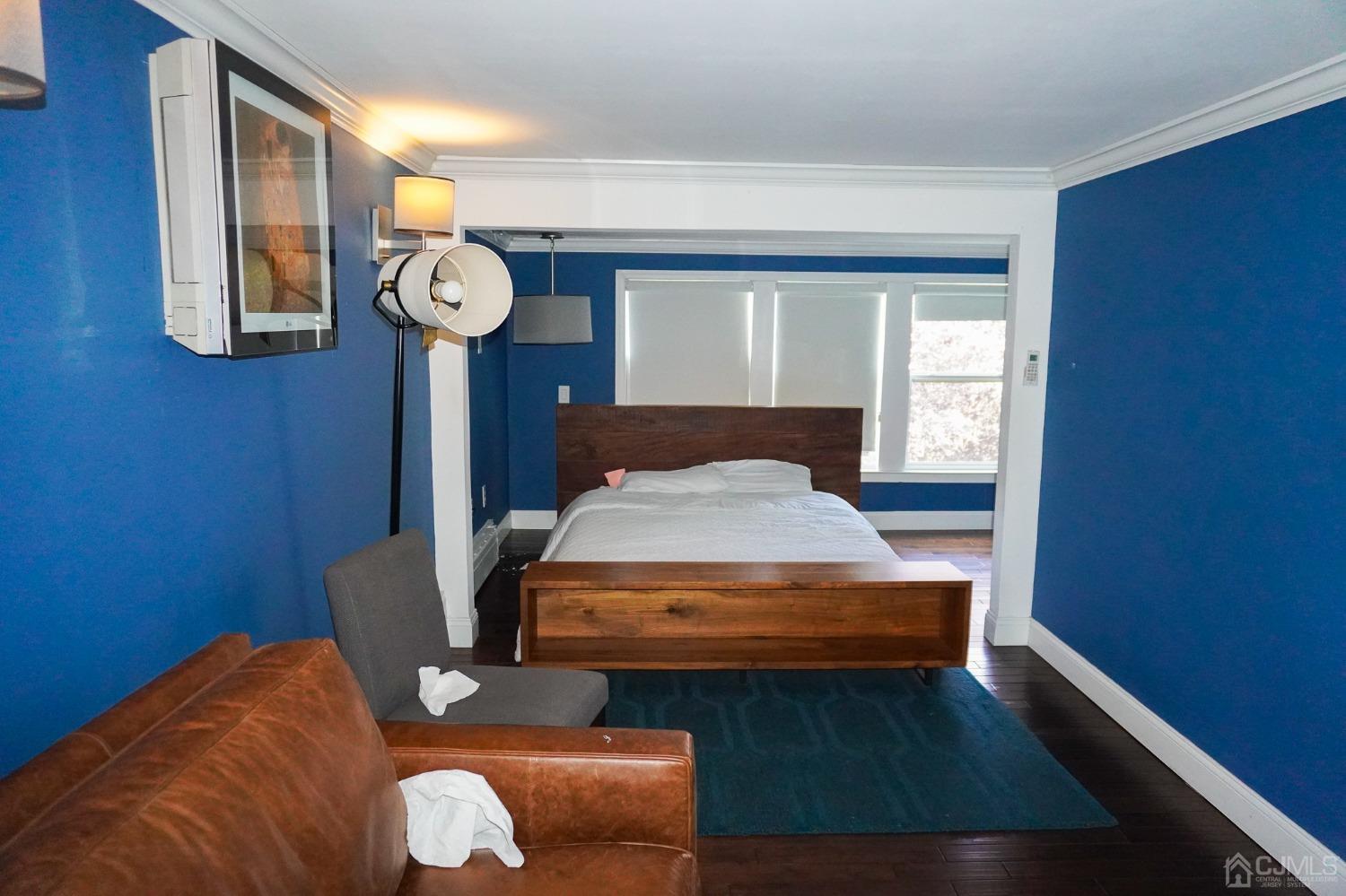 140 Meredith Road Colonia, NJ 07067 - Photo 23 of 30 a bedroom with furniture and a window