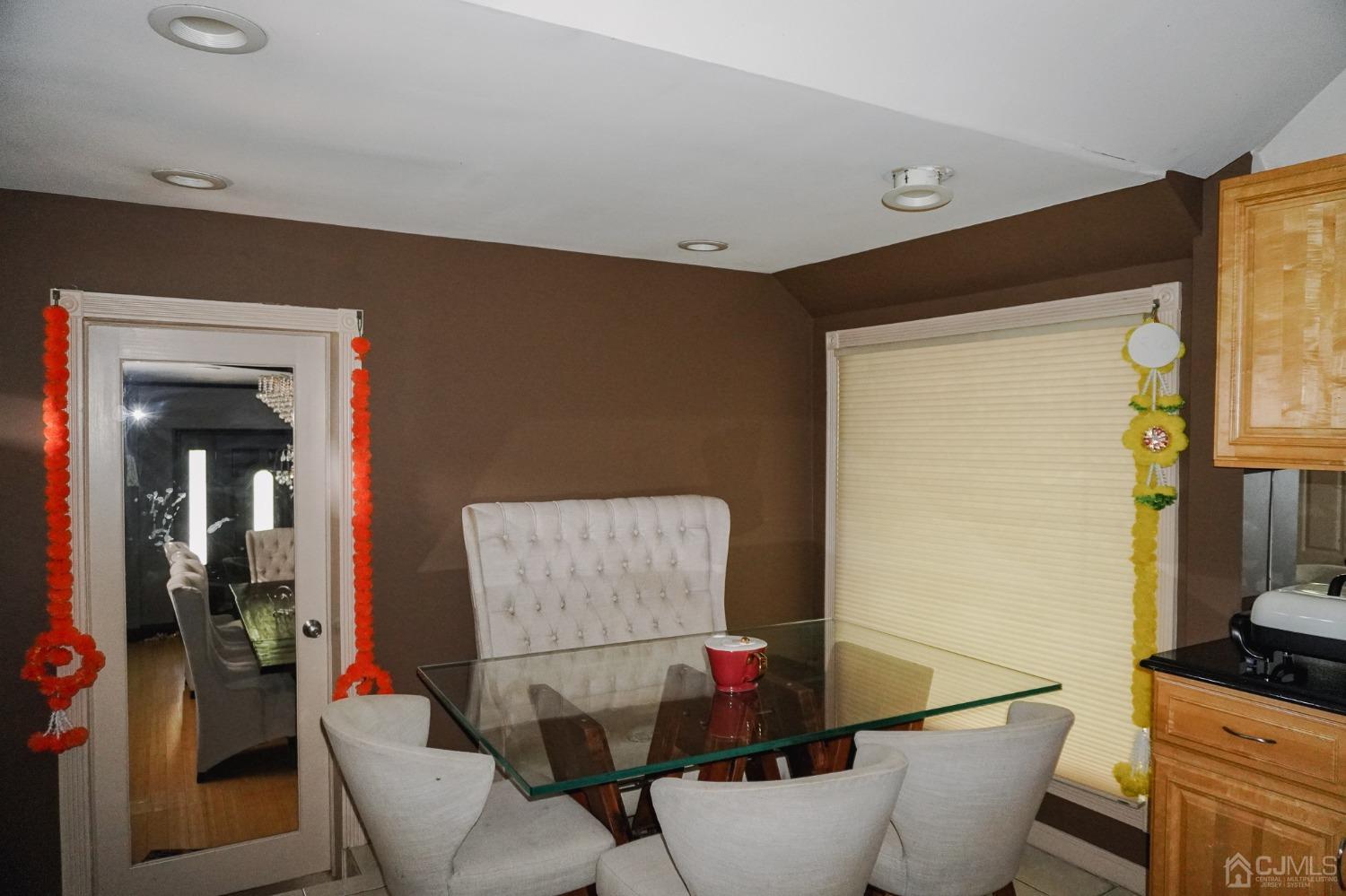 140 Meredith Road Colonia, NJ 07067 - Photo 30 of 30 a living room with furniture and a flat screen tv