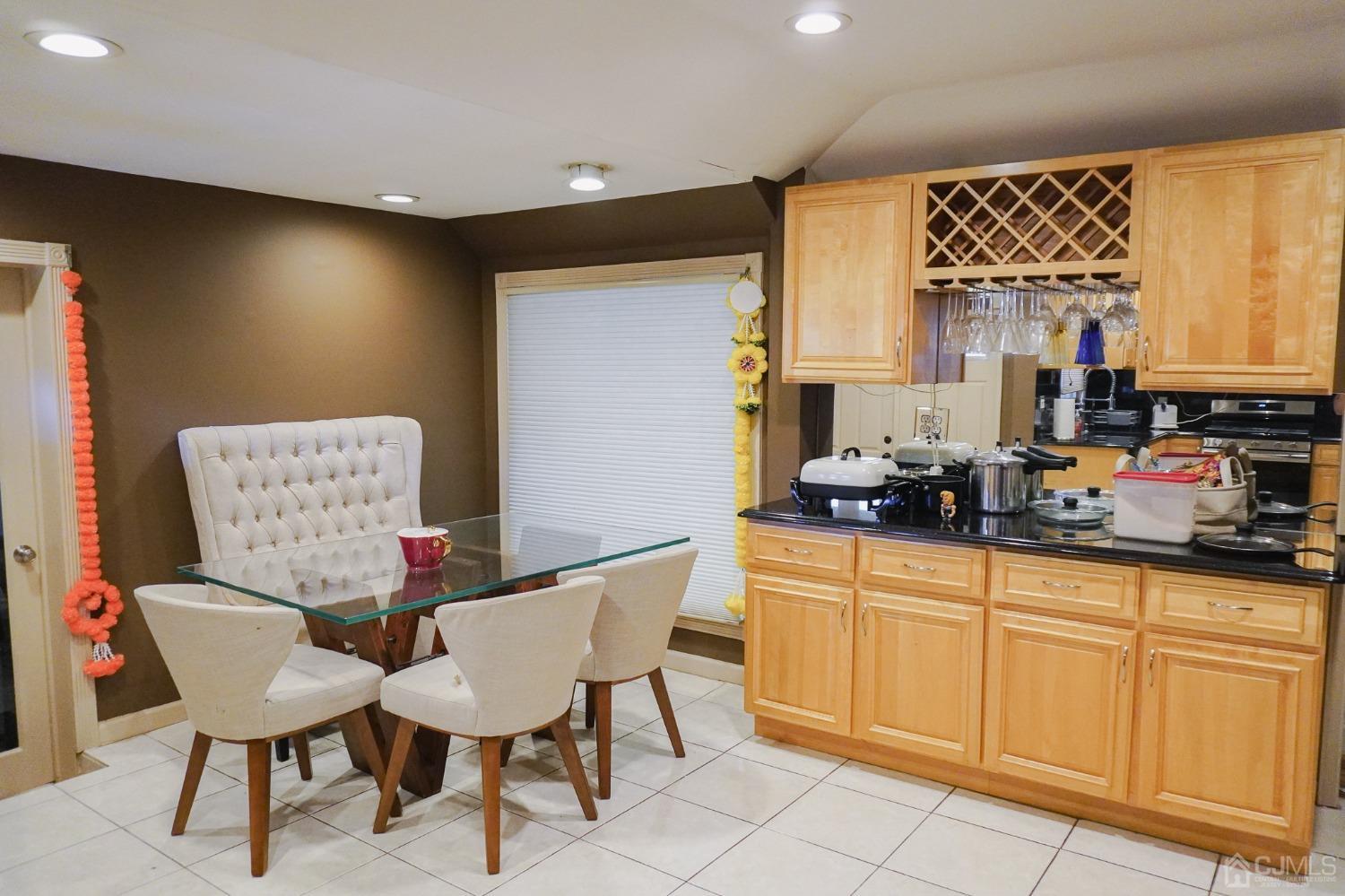 140 Meredith Road Colonia, NJ 07067 - Photo 6 of 30 a view of a dining room with furniture and window