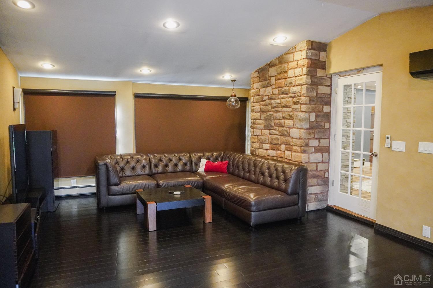 140 Meredith Road Colonia, NJ 07067 - Photo 9 of 30 a living room with furniture and a flat screen tv