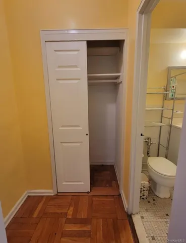 a bathroom with a toilet and a sink