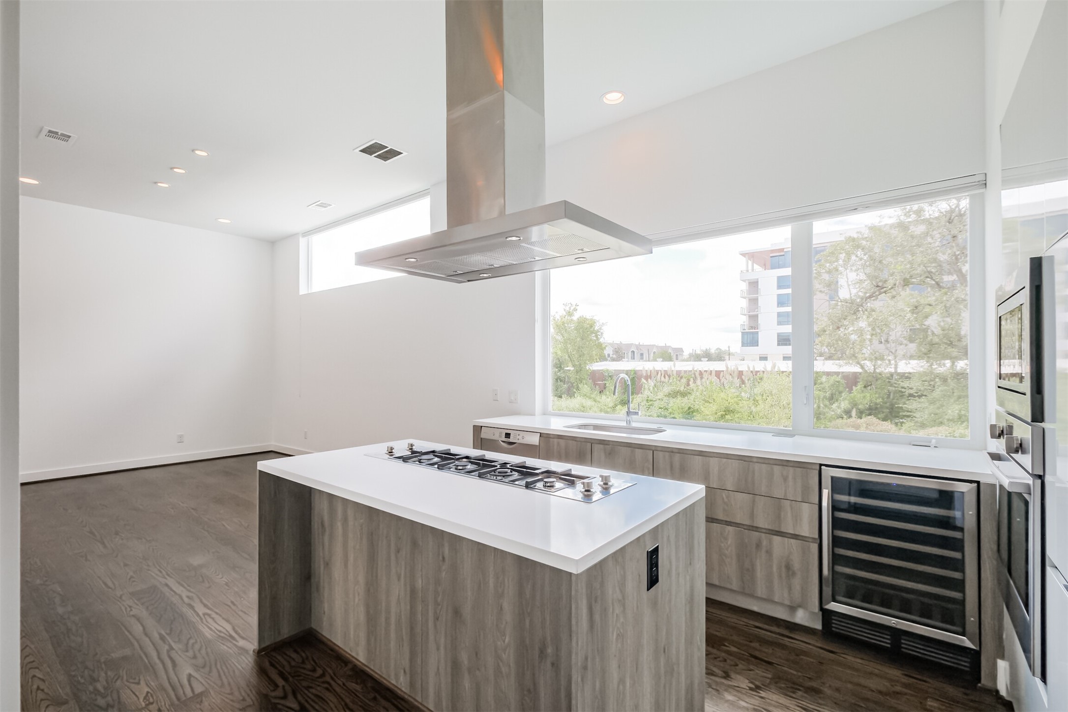 1157 West 18th Street Houston, TX 77008 - Photo 12 of 41 a view of a kitchen with a sink and large window